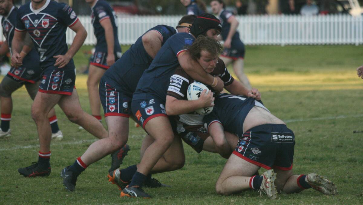 Gilgandra's Kenny Johnson attempts to break through the Cobar defence on Saturday, June 29. Picture by Stephen Basham