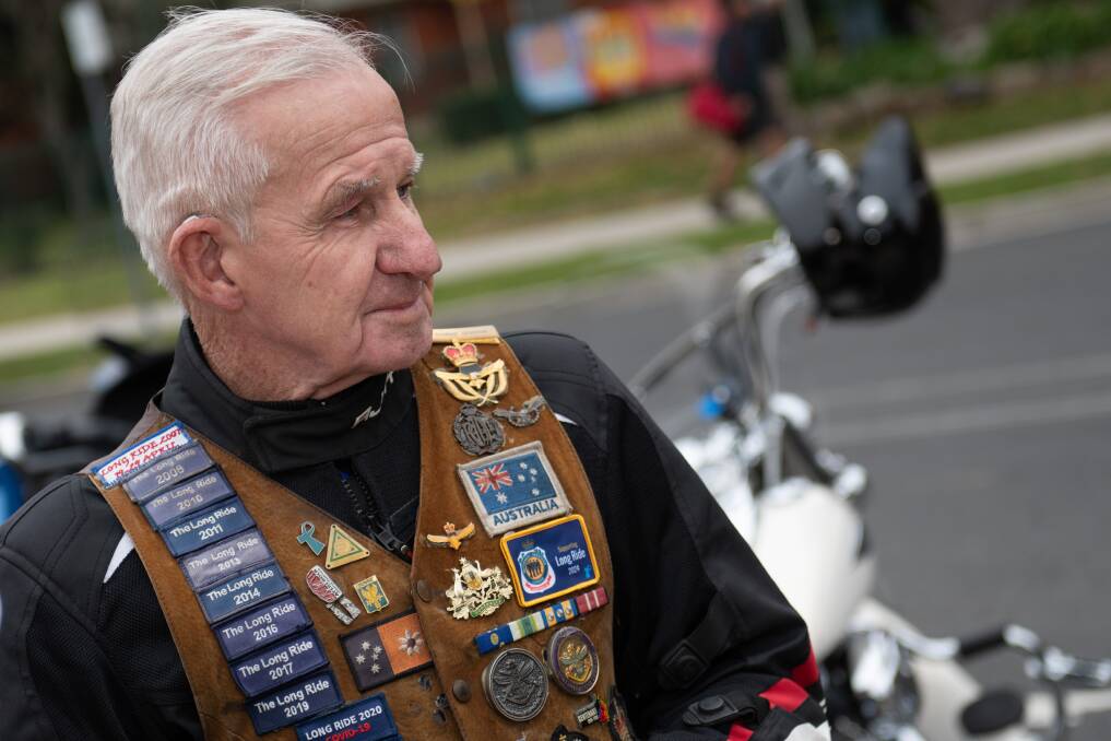 Christopher Dunne, one of the founders of The Long Ride, wearing his jacket with badges. Picture by James Arrow