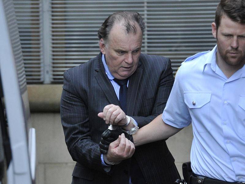 Glen McNamara (centre) claimed evidence showed he feared for his life and acted under duress. (Joel Carrett/AAP PHOTOS)