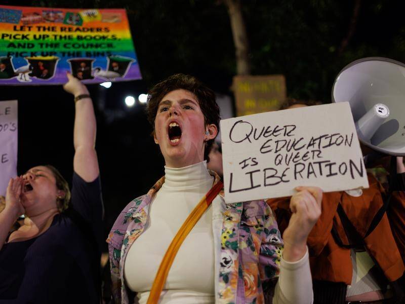 Hundreds of protesters gathered to oppose banning a book on gay parenting. (Paul Braven/AAP PHOTOS)