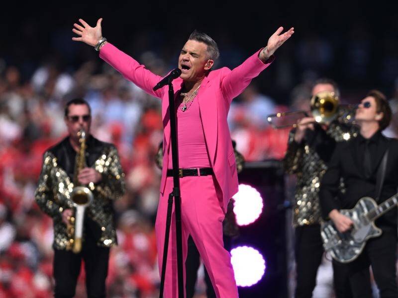Tour promoters are suing the Australian Grand Prix over its cancelled Robbie Williams concert. (James Ross/AAP PHOTOS)