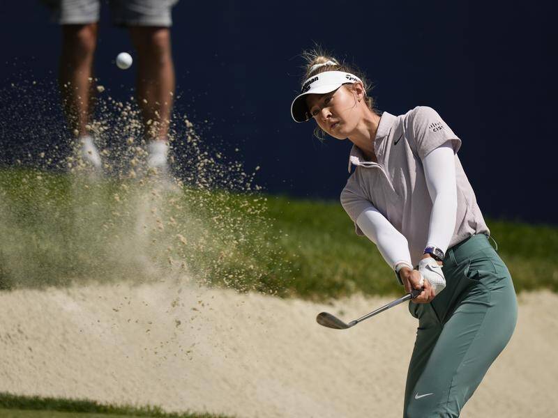 Nelly Korda chips from a bunker during her troubled first round at the US Women's Open. (AP PHOTO)