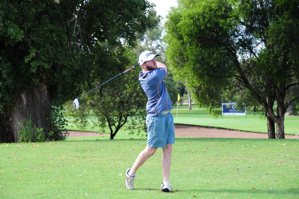 James Leonard looks for a long drive at Dubbo Golf Club.