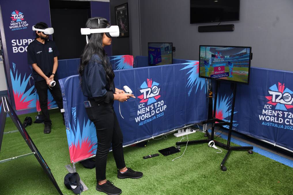 Jaya Polavarapu and Suri Prakash try their best in the virtual reality game. Picture by Amy McIntyre