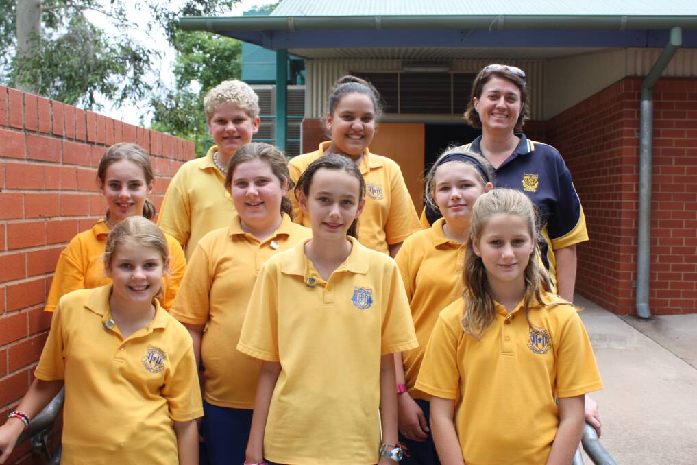 (u'Library Monitors (back row) William Macander, Jacinta Newman and Mrs Smith, (middle row) Hailee Rumbel, Ruby Piper and Elouise Priest-Bayley and (front) Katie Alston, Jorja Fuller and Ellee Taylor (Absent: Via Filisi and Sadhir Shiraj)',)
